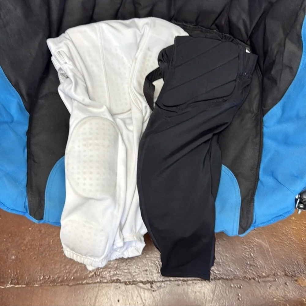 Two pairs of boys football pants size small